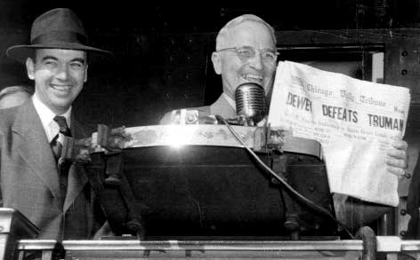 photo of Richard Carter and Truman with newspaper