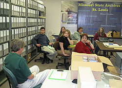 Conservators conducted a training session for the new archivists and worked with them to finalize procedures for the project.