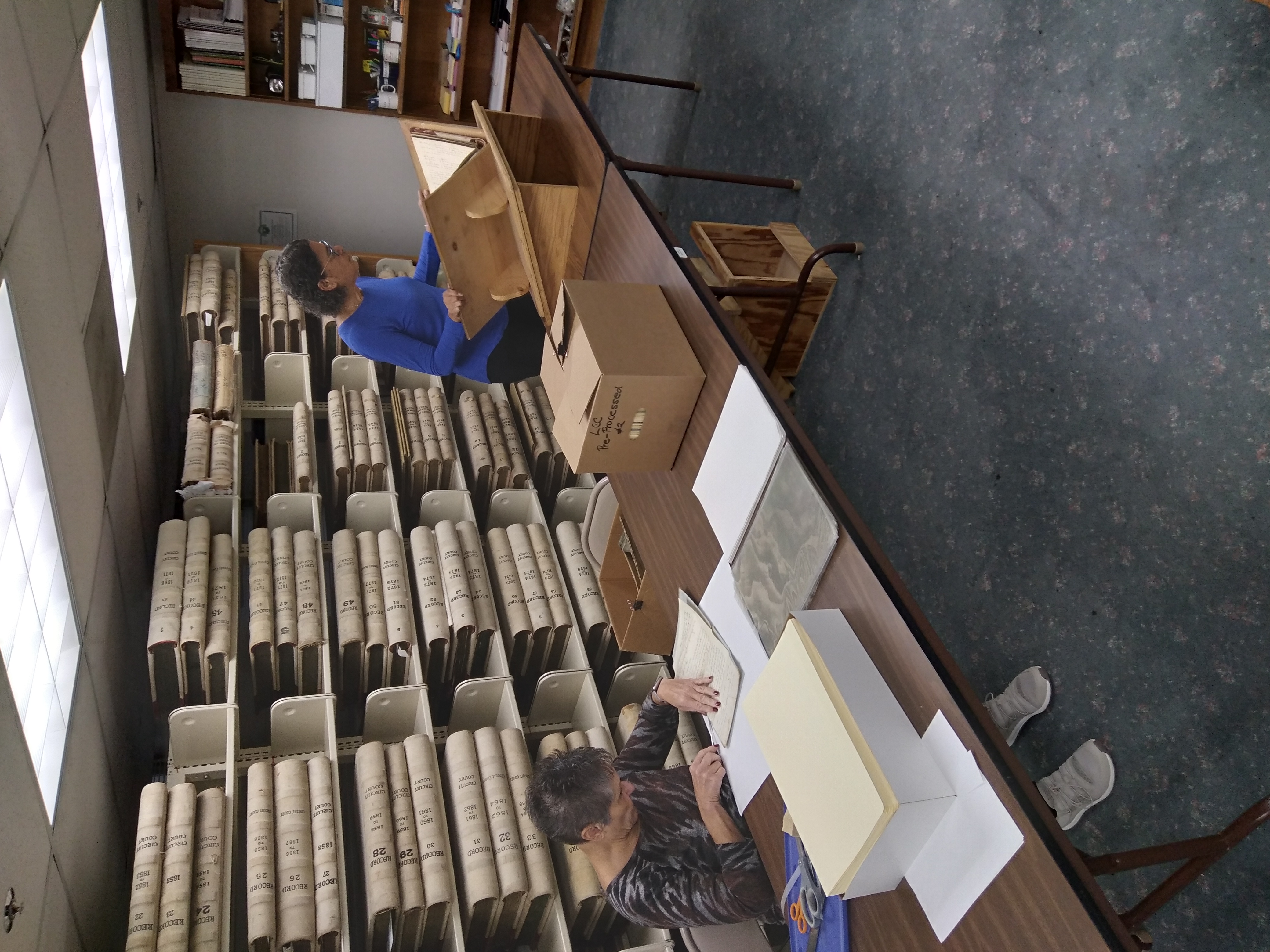 Employees looking through records at Missouri State Archives in Saint Louis