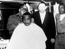 Sonny Liston receiving a haircut in the Missouri State Penitentiary, c1950