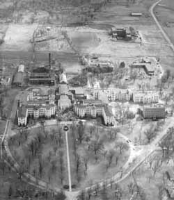 Aerial view of State Hospital No. 1 after fire destroyed the 105 year-old Administration Building, 1956.