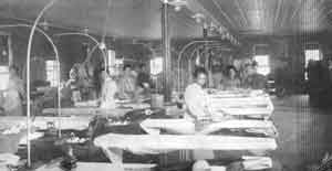 Patients at work in the hospital laundry, c. 1910