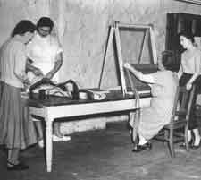 Hospital patients at work on craft and art projects, c. 1960.