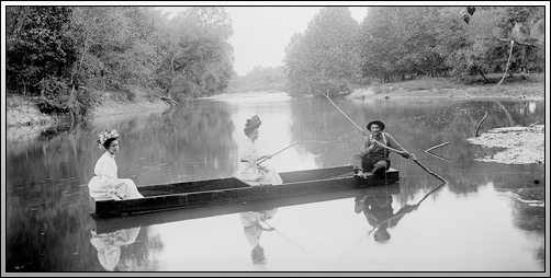 Jennie Ware, Mary Ware, and Tom Gill, boating on the Piney River