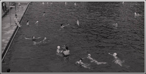 Swimmers in the Municipal Swimming Pool